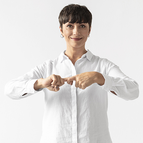 Woman teaching American Sign Language