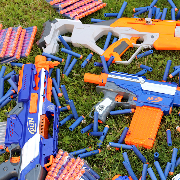 Nerf guns and darts on the grass