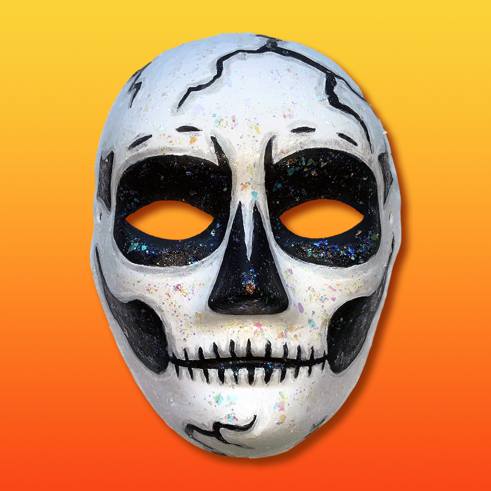 Hand painted skeleton mask on yellow to orange background