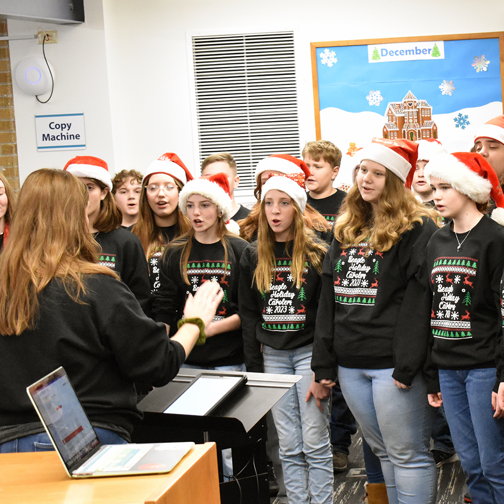 Beagle Holiday Carolers at the Pre-Parade Party