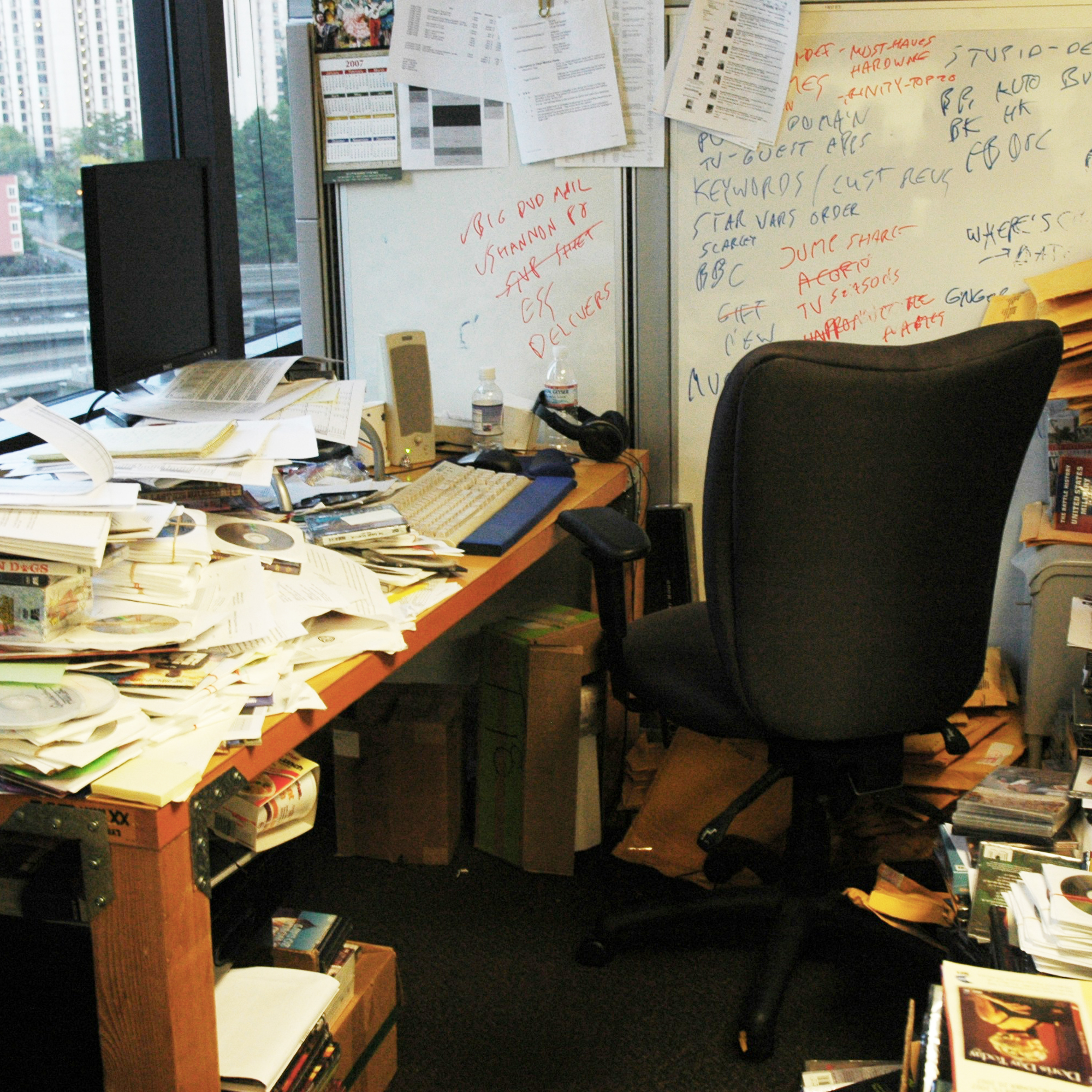 Cluttered office space with papers everywhere