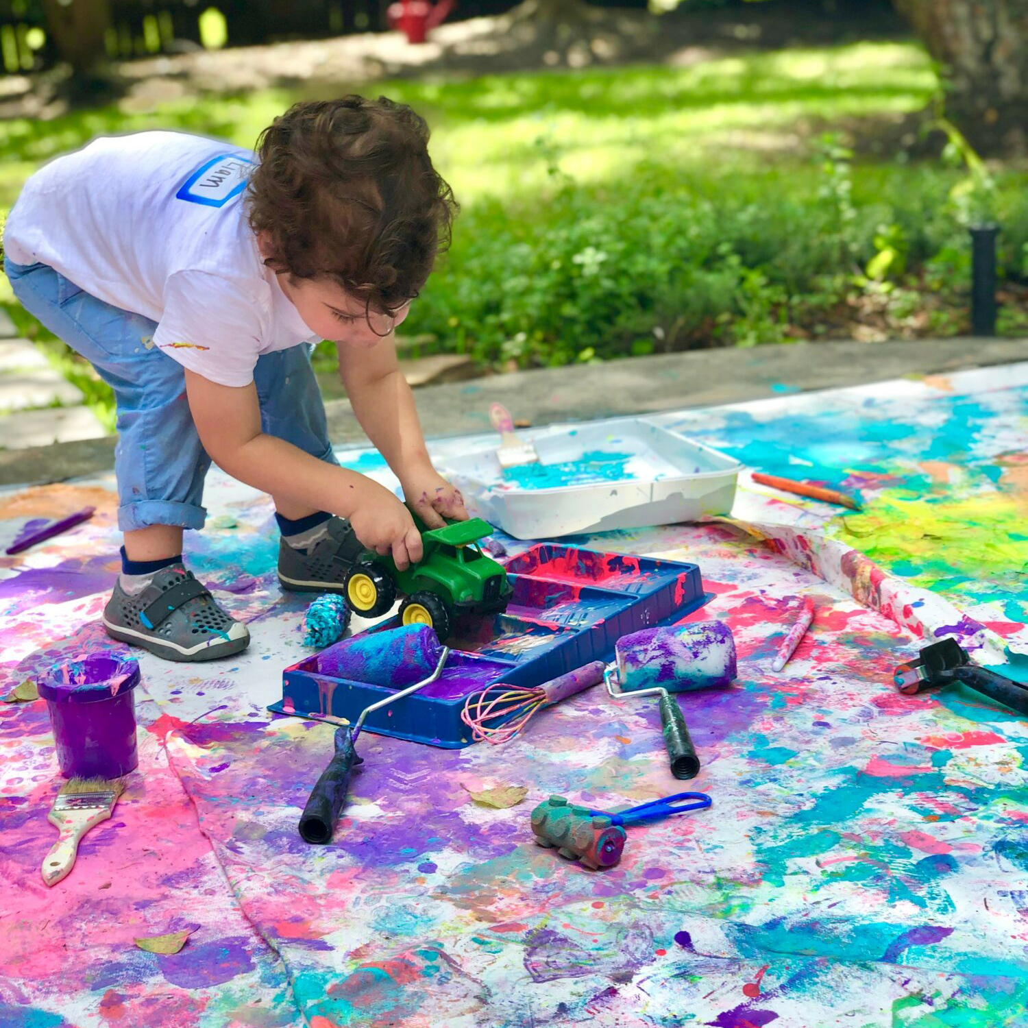 Kid making messy art