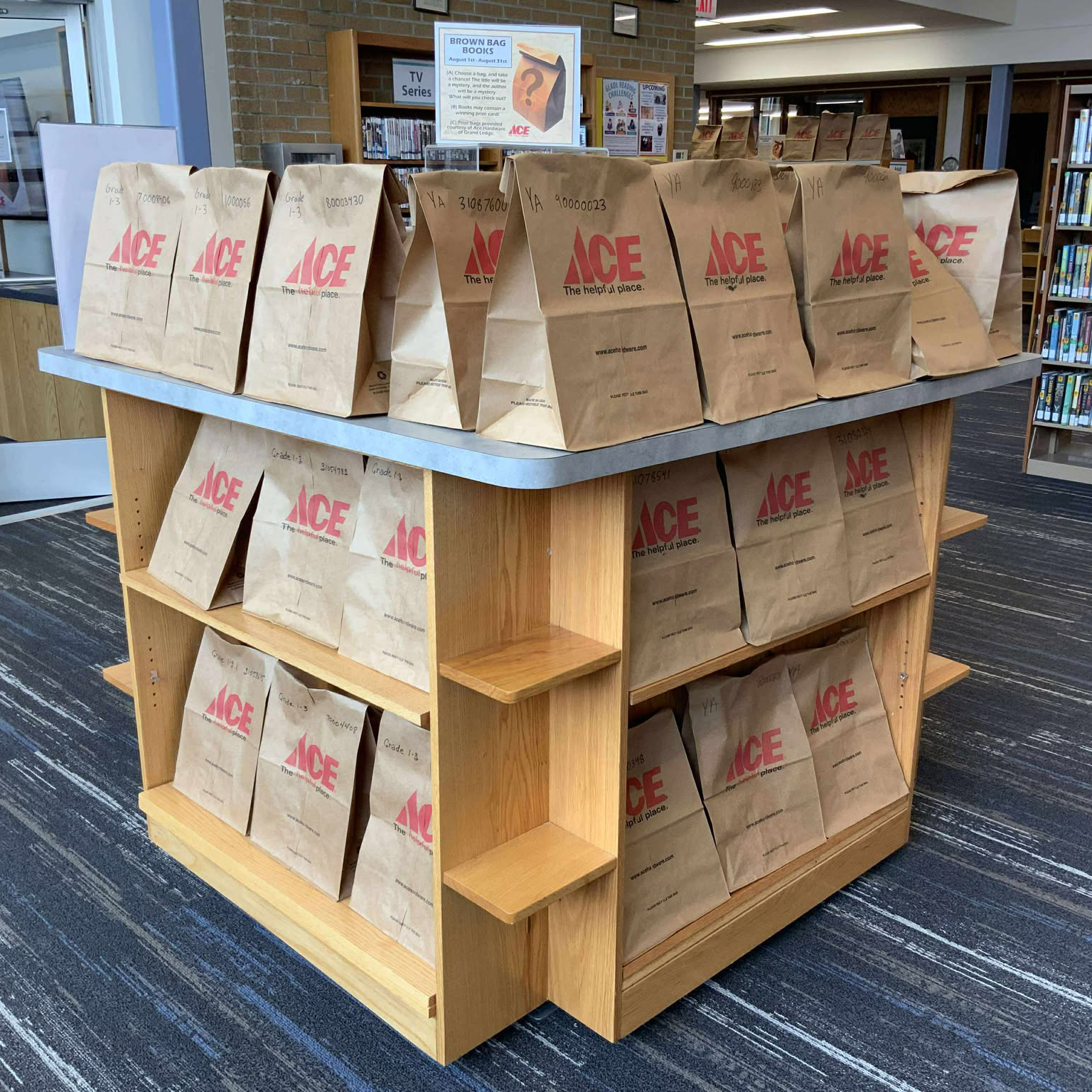 Shelf full of brown bag books
