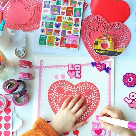 Child making valentine's cards