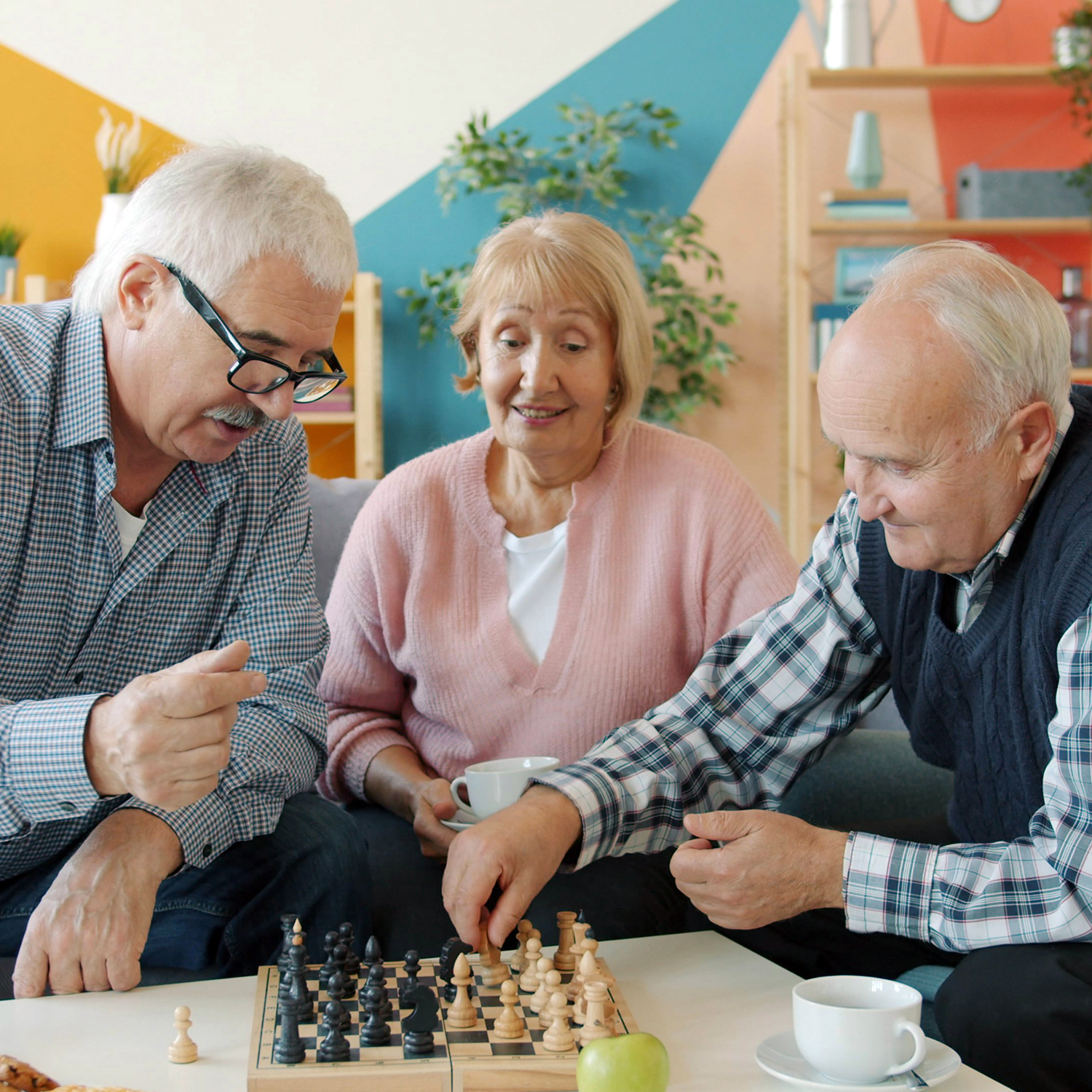 Adults playing chess
