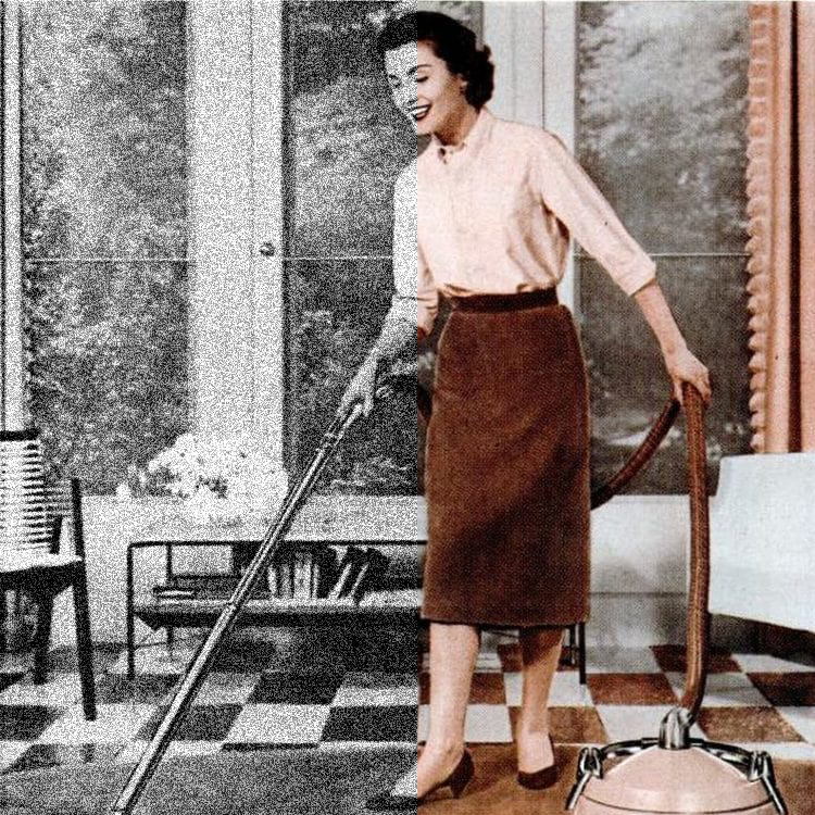 Grainy old photo of a woman vacuuming