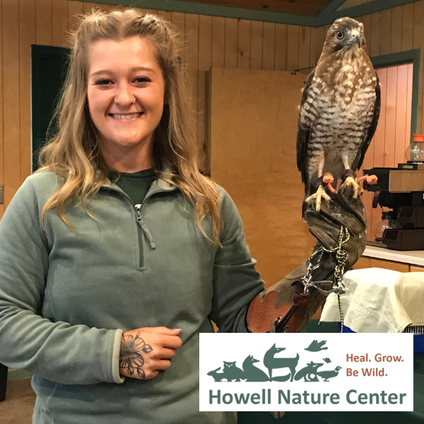 Woman holding hawk