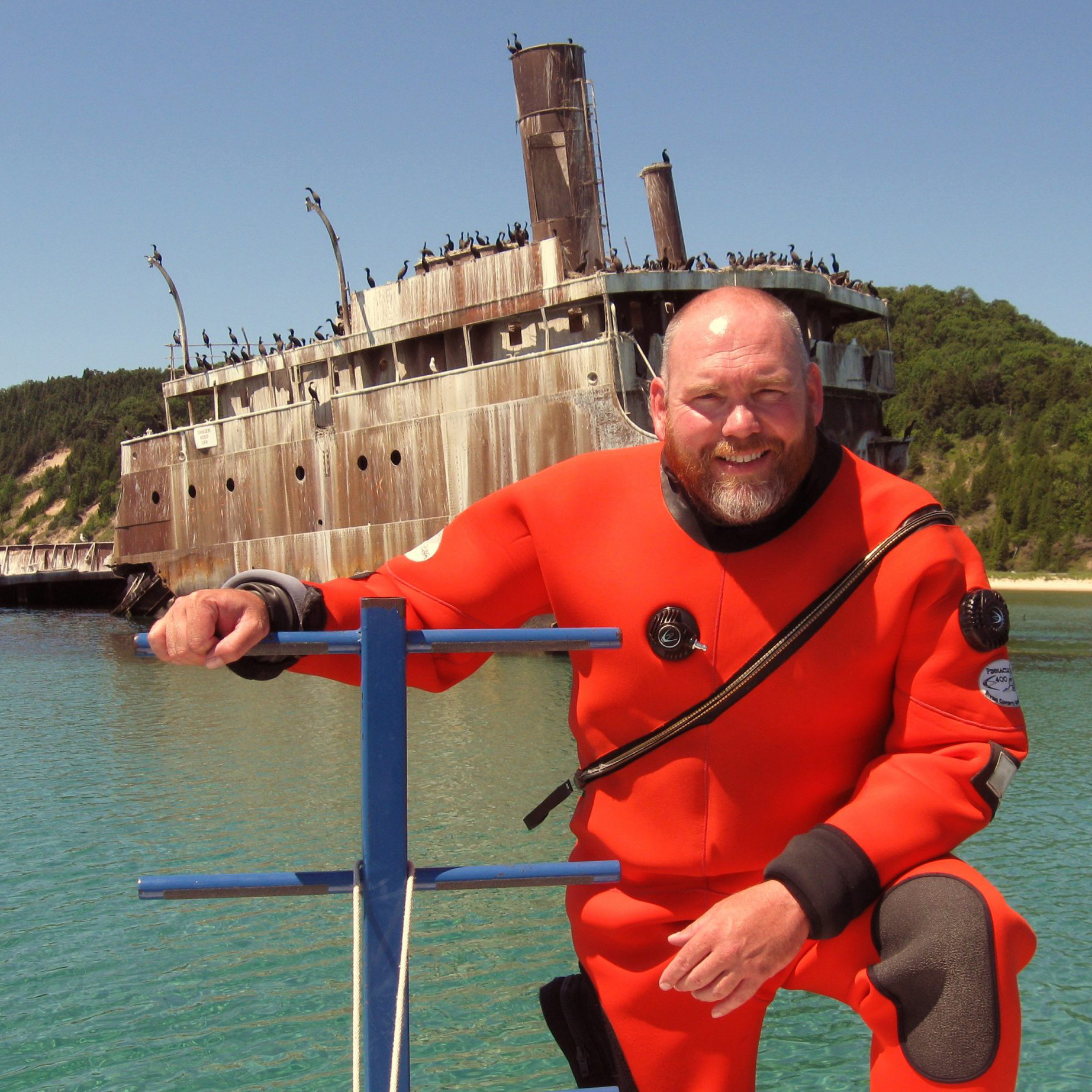 Ross Richardson by a shipwreck
